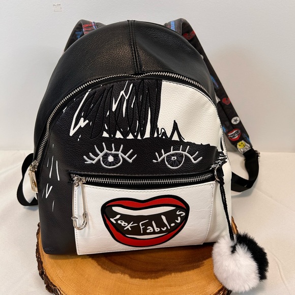 Danielle Nicole Handbags - Danielle Nicole Disney‎ Cruella “Look Fabulous!” Fashion Mini Backpack